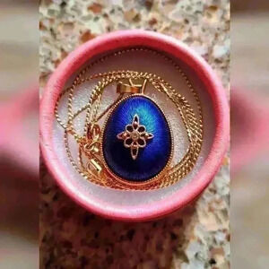 Avon Vintage necklace Goldtone with blue silk thread  Avon Egg Necklace
